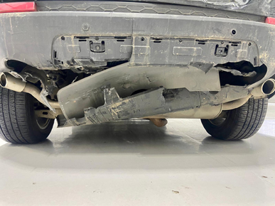 Image depicting bodywork damage to bumper in more detail